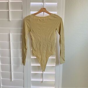 NWOT Intimately Free People Playing Favorites Bodysuit In light tan XS